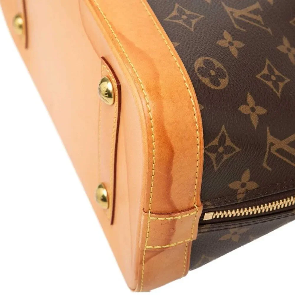 Louis Vuitton Alma PM Monogram Handbag